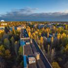 Flygbild över Tjernobyls kärnkraftverk i Ukraina, som omges av en exklusionszon efter olyckan 1986. Foto: SAUEZM, Ukrainas statliga myndighet för förvaltning av exklusionszonen.