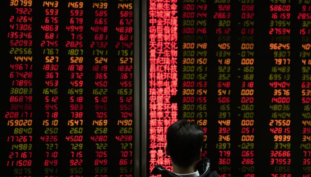 Ng Han Guan/AP/TT: Nedåt i Tokyo men uppåt i Hongkong under morgonens handel. Arkivbild.