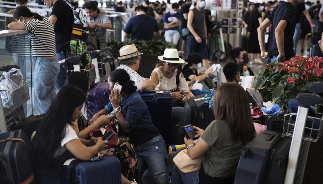 Vincent Thian/AP: Resenärerna är på väg tillbaka till Hongkong. Arkivbild.