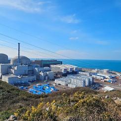 Flamanville 3:s reaktorbyggnad under uppbyggnad. Den franska kärnreaktorn har nu nått full effekt efter flera års förseningar. Foto: EDF/X